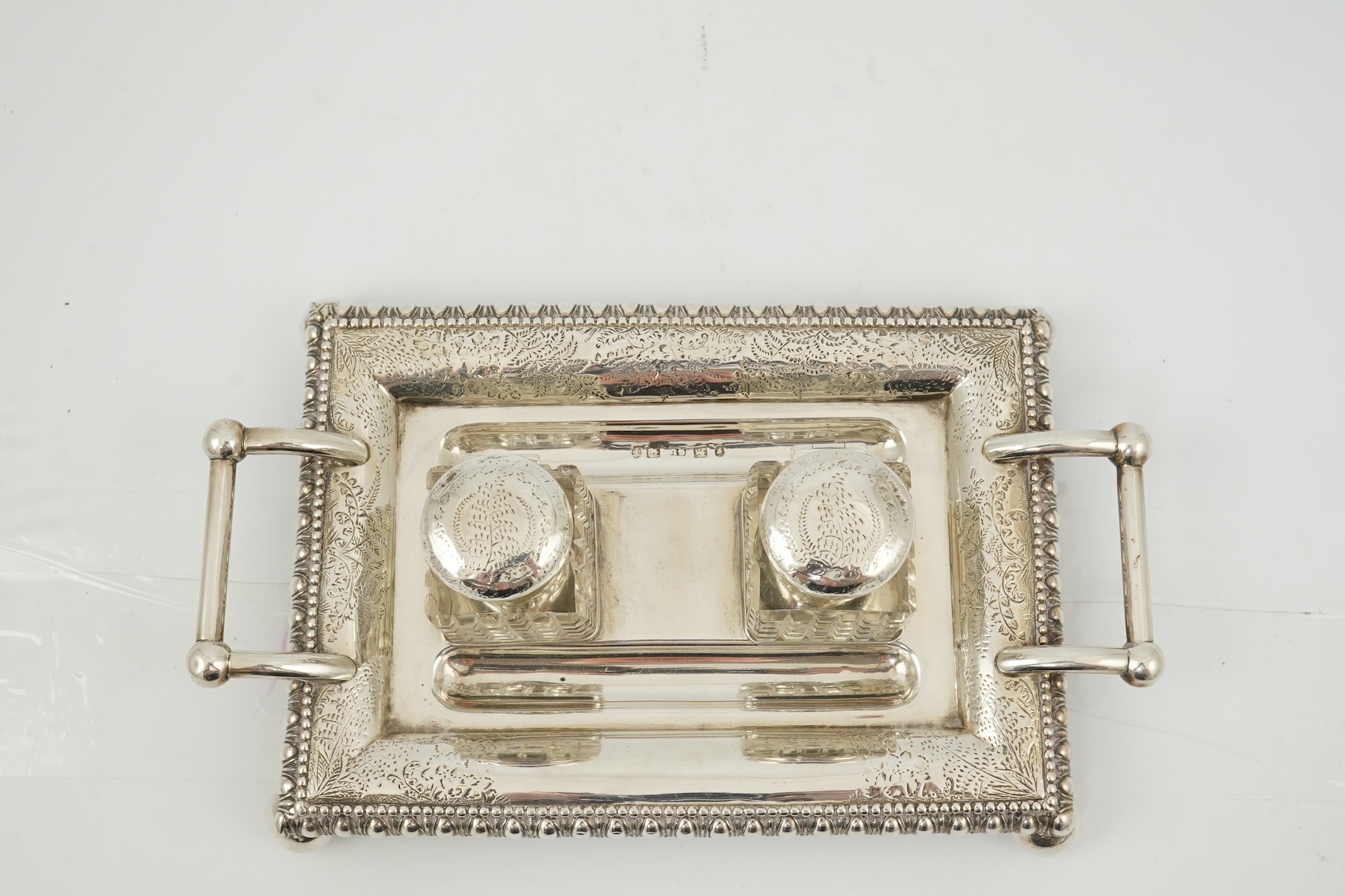 A late Victorian silver two handled rectangular inkstand by George Unite
